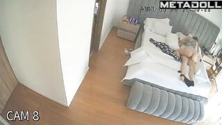 An excited wife sits on her husband's face, who has laid down to rest