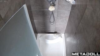 Completely naked Asian girl in the shower lathers her seductive body