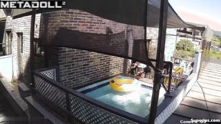 Asian couple enjoying swimming together (inflatable pool in the yard)