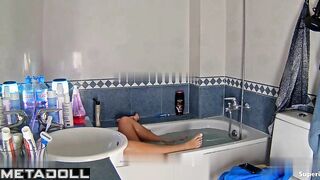 Beauty playing solo game in the bathroom (with a sex toy)