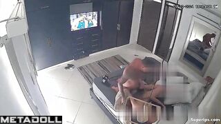 They fuck, not paying attention to the TV that is on