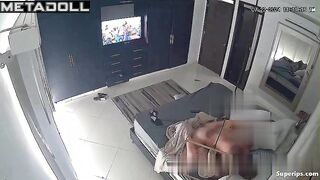 They fuck, not paying attention to the TV that is on