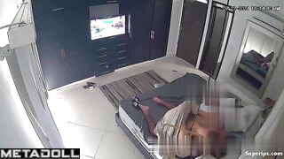 They fuck, not paying attention to the TV that is on