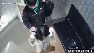 Asian couple enjoying singing and kissing in the karaoke