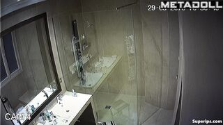 Cute milf washes her tender big tits while taking a shower