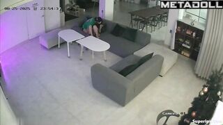 Sexual entertainment of a young couple on a large sofa