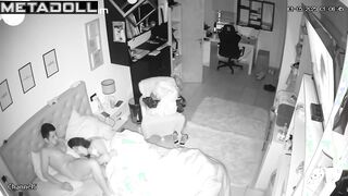 A seductive wife plays with her bored husband's penis while watching TV