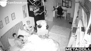 A seductive wife plays with her bored husband's penis while watching TV