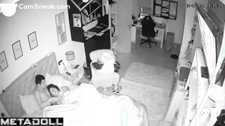 A seductive wife plays with her bored husband's penis while watching TV