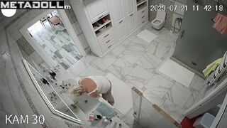 Hidden camera video in the toilet of a fat blonde milf