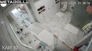 Hidden camera video in the toilet of a fat blonde milf