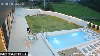 Asian couple fooling around in the pool (summer vibes)