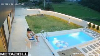 Asian couple fooling around in the pool (summer vibes)