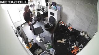 Brunette argues with husband while sitting over the toilet