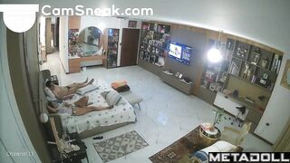 Lazy missionary in the living room between spouses
