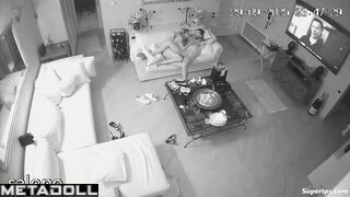 Two naked couples have intercourse in the living room while watching TV