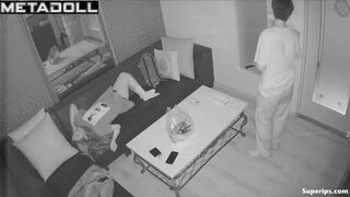 Young boyfriend kisses and caresses his Asian girlfriend in a karaoke room