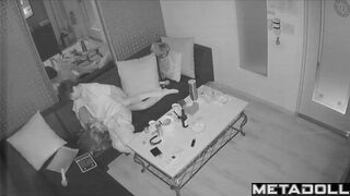 Young boyfriend kisses and caresses his Asian girlfriend in a karaoke room