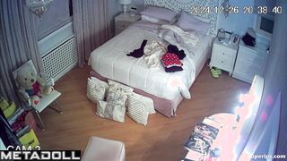 Young cutie with a seductive body undresses during a phone call
