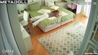 Red-haired teenage girl plays with her wet pussy under the blanket