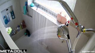 Young ebony girl caresses her sexy body while taking a shower