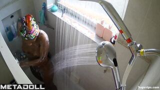Young ebony girl caresses her sexy body while taking a shower