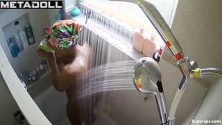 Young ebony girl caresses her sexy body while taking a shower