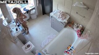 A skinny cutie with a sexy body gets dressed after taking a bath