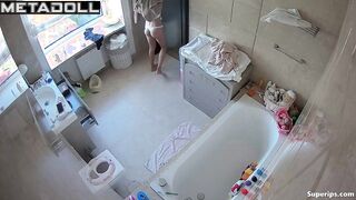 A skinny cutie with a sexy body gets dressed after taking a bath