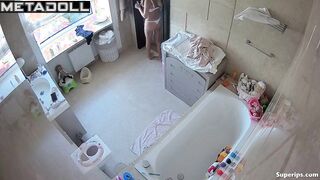 A skinny cutie with a sexy body gets dressed after taking a bath