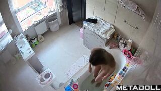 A skinny naked beauty with a seductive body is getting ready to take a bath