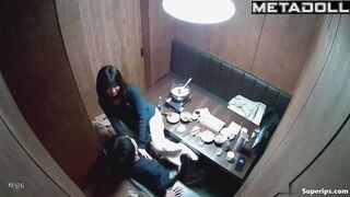 Asian cuties kissed sweetly in an expensive restaurant
