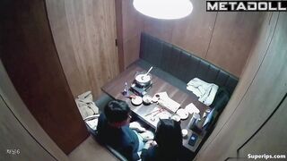 Asian cuties kissed sweetly in an expensive restaurant