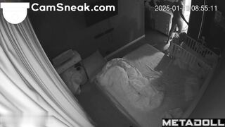 Parents enjoying each other while they are alone in the room
