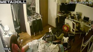 She sat down on the floor, pulled down her panties and began to masturbate