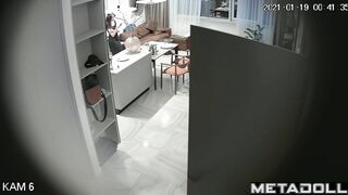 Romantic prelude between spouses, living room cam