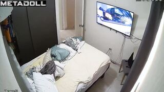 She was changing clothes and watching TV at the same time