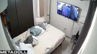 She was changing clothes and watching TV at the same time