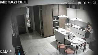 Bald guy kissing his sexy young wife - living room tape