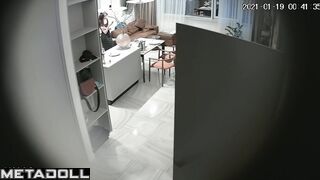 Husband and wife enjoying bright foreplay in the living room