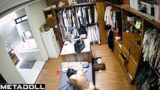 Brunette watching porn and masturbating in the dressing room