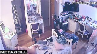 Her cozy bedroom is under spy surveillance and it doesn't bother her