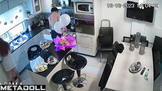 Young couple skipped lessons and kissed in the kitchen