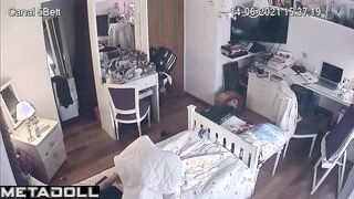 Her hands enjoying her clit again under the blanket