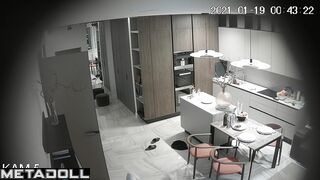 Horny husband kissing his naked wife in the living room