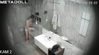 Husband and wife enjoying taking a shower together