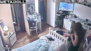 Young redhead lady and her lonely evening, home tape
