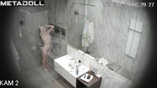 Young brunette washed her firm body thoroughly, look
