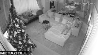 Someone is watching them cum together near the Christmas tree