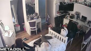 Teenagers petting and kissing in the closed bedroom